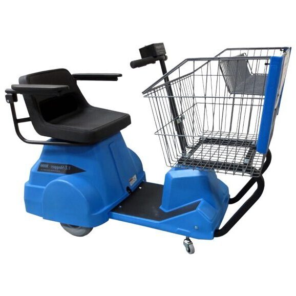 A blue motorized shopping cart with a black seat and armrests. It has a wire shopping basket attached to the front and a handlebar with controls. The cart has three wheels, with two small front wheels and a larger rear wheel.